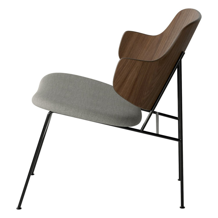 The Penguin Timber Lounge Chair by Audo Copenhagen - The Penguin Lounge Chair is a mid-century masterpiece. Reclining and harmonious, but with plenty of boldness, it is characterised by calmness and balance. Sitting in this deep, low chair feels comfortab