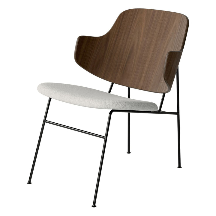 The Penguin Timber Lounge Chair by Audo Copenhagen - The Penguin Lounge Chair is a mid-century masterpiece. Reclining and harmonious, but with plenty of boldness, it is characterised by calmness and balance. Sitting in this deep, low chair feels comfortab