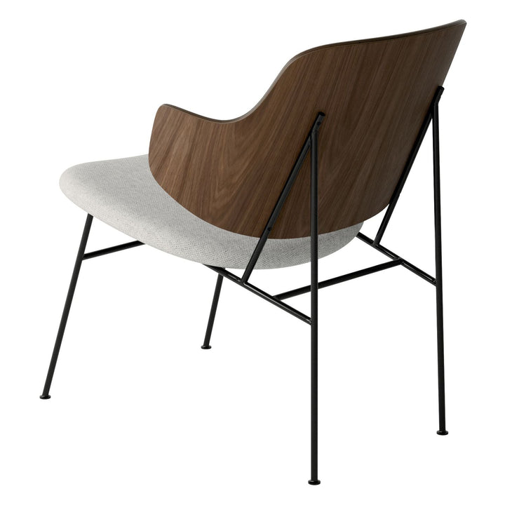 The Penguin Timber Lounge Chair by Audo Copenhagen - The Penguin Lounge Chair is a mid-century masterpiece. Reclining and harmonious, but with plenty of boldness, it is characterised by calmness and balance. Sitting in this deep, low chair feels comfortab