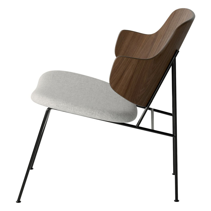 The Penguin Timber Lounge Chair by Audo Copenhagen - The Penguin Lounge Chair is a mid-century masterpiece. Reclining and harmonious, but with plenty of boldness, it is characterised by calmness and balance. Sitting in this deep, low chair feels comfortab