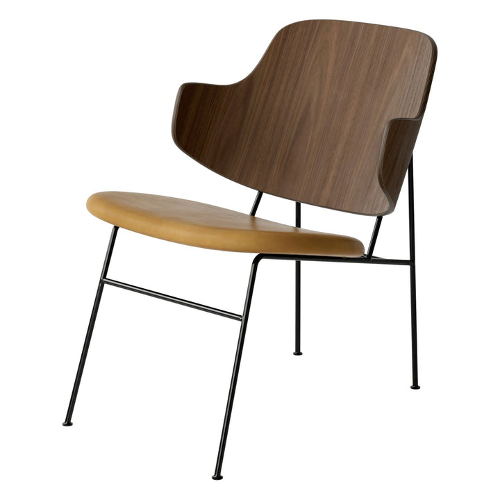 The Penguin Timber Lounge Chair by Audo Copenhagen - The Penguin Lounge Chair is a mid-century masterpiece. Reclining and harmonious, but with plenty of boldness, it is characterised by calmness and balance. Sitting in this deep, low chair feels comfortab