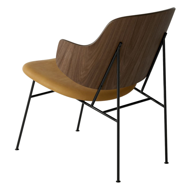 The Penguin Timber Lounge Chair by Audo Copenhagen - The Penguin Lounge Chair is a mid-century masterpiece. Reclining and harmonious, but with plenty of boldness, it is characterised by calmness and balance. Sitting in this deep, low chair feels comfortab