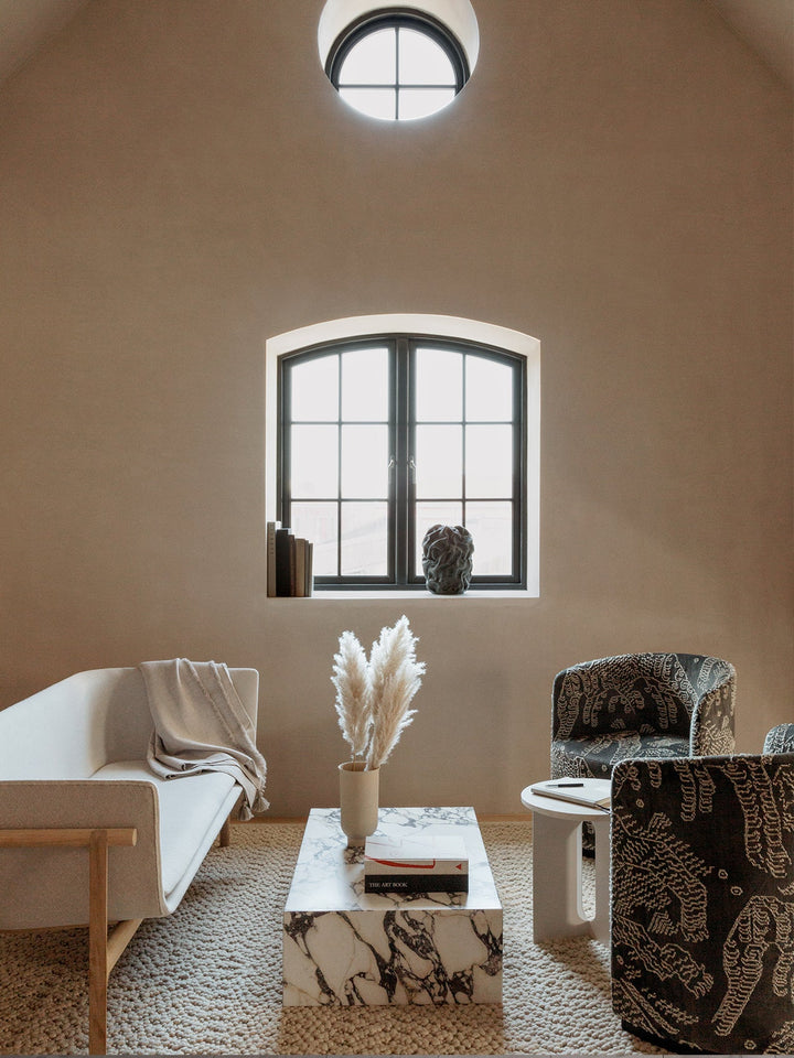 Plinth Low by Audo Copenhagen - The Plinth Low is a stunning addition to the Plinth Collection, featuring natural materials and expert craftsmanship. Its elegant design brings warmth and texture to any space. Available in a variety of marble options, incl