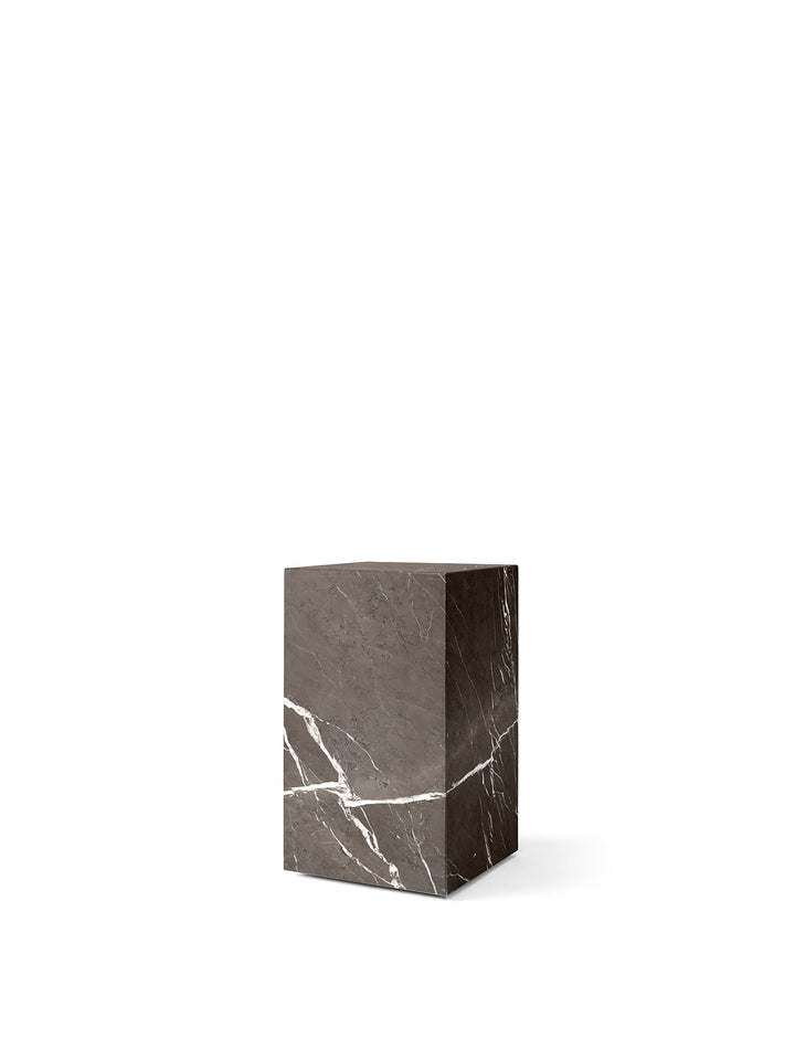 Plinth Tall by Audo Copenhagen - The Plinth Tall from the Plinth Collection boasts supreme craftsmanship and natural materials, including Calacatta Viola, Grey Kendzo, Nero Marquina, and White Carrera marble. With a symmetrical design, it serves as both a