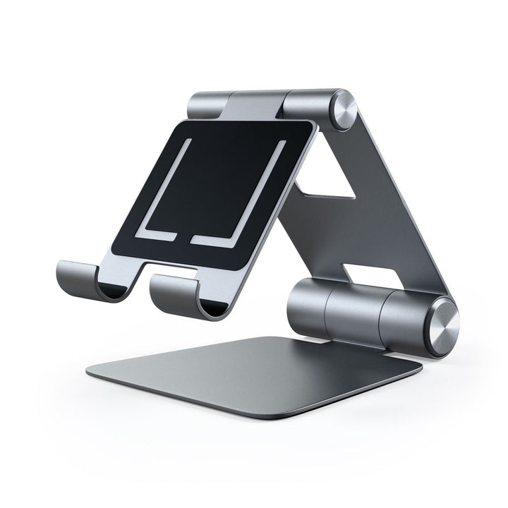 Satechi R1 Foldable Mobile Stand for Laptops & Tablets The Satechi R1 stand quickly elevates any mobile device or tablet for an optimal viewing experience. Constructed from solid aluminium, the R1's supporting grips are finished in rubber to hold your tab