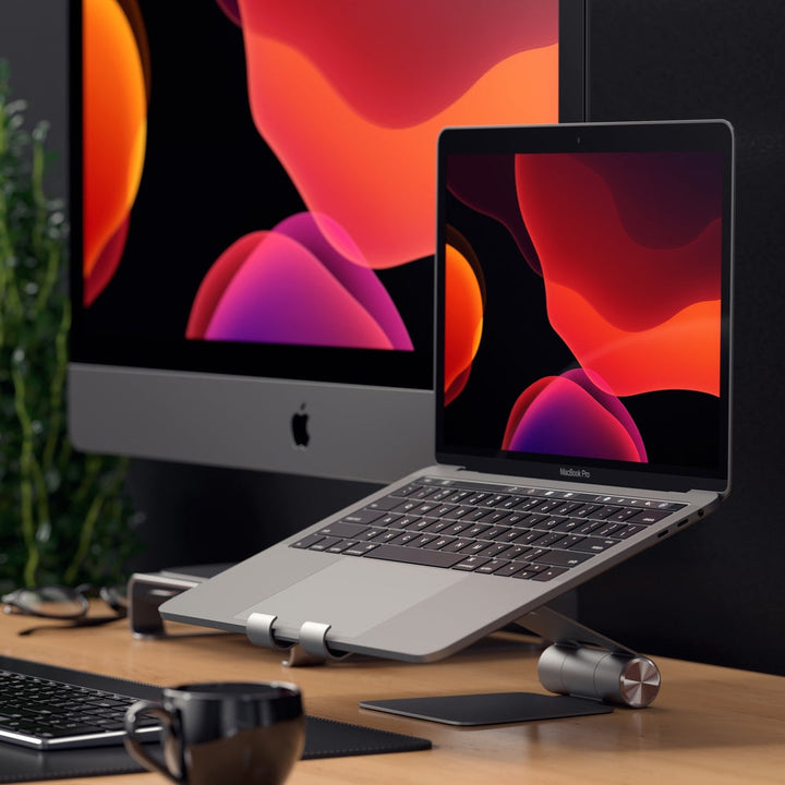 Satechi R1 Foldable Mobile Stand for Laptops & Tablets The Satechi R1 stand quickly elevates any mobile device or tablet for an optimal viewing experience. Constructed from solid aluminium, the R1's supporting grips are finished in rubber to hold your tab