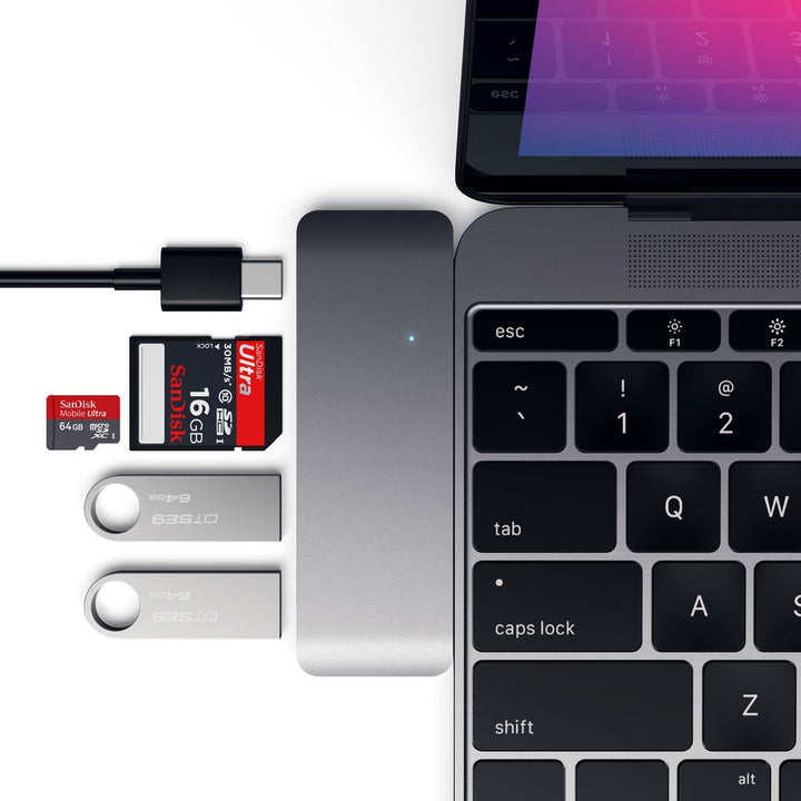 Satechi USB-C USB Pass Through Hub The Satechi Type-C Pass-Through USB Hub with USB-C Charging Port features a Type-C charging port, two USB 3.0 ports, an SD card slot and a Micro SD card slot. Use the Type-C Pass Through Hub to charge your Macbook as wel