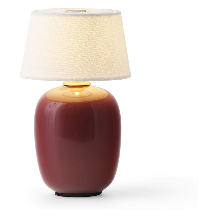 Torso Portable Table Lamp by Audo Copenhagen - The Torso Portable Table Lamp by Krøyer-Sætter-Lassen is a miniature version of their popular full-size design of the same name, which takes its design cues from childhood homes filled with treasures shaped b