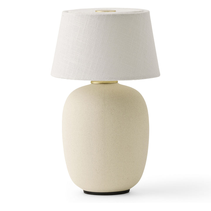 Torso Portable Table Lamp by Audo Copenhagen - The Torso Portable Table Lamp by Krøyer-Sætter-Lassen is a miniature version of their popular full-size design of the same name, which takes its design cues from childhood homes filled with treasures shaped b