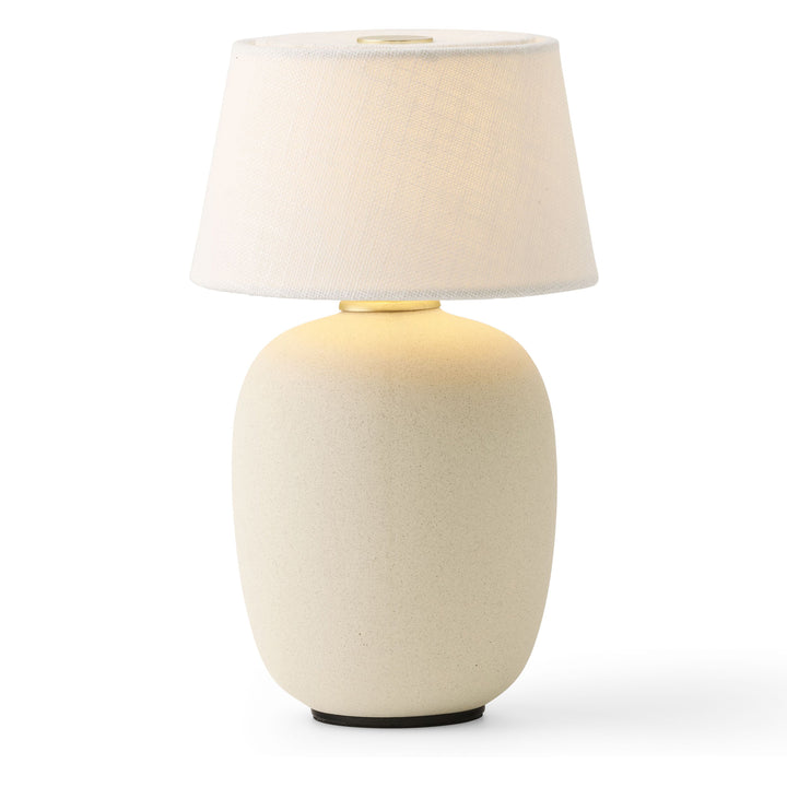 Torso Portable Table Lamp by Audo Copenhagen - The Torso Portable Table Lamp by Krøyer-Sætter-Lassen is a miniature version of their popular full-size design of the same name, which takes its design cues from childhood homes filled with treasures shaped b