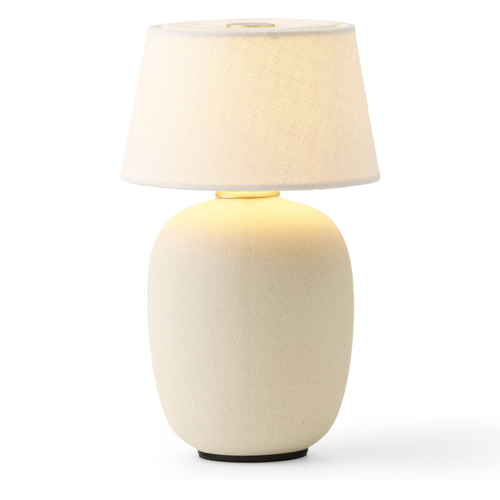 Torso Portable Table Lamp by Audo Copenhagen - The Torso Portable Table Lamp by Krøyer-Sætter-Lassen is a miniature version of their popular full-size design of the same name, which takes its design cues from childhood homes filled with treasures shaped b