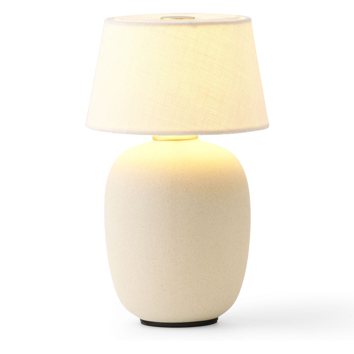 Torso Portable Table Lamp by Audo Copenhagen - The Torso Portable Table Lamp by Krøyer-Sætter-Lassen is a miniature version of their popular full-size design of the same name, which takes its design cues from childhood homes filled with treasures shaped b