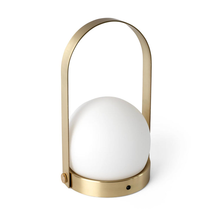 AUDO CPH (ex MENU) Carrie Lamp Portable + Rechargeable, Brushed Brass by Audo Copenhagen - The new “Carrie” LED Lamp by Norm Architects is versatile, fully portable and re-chargeable. In Denmark, where winters are cold and long, creating a warm, cozy atmo