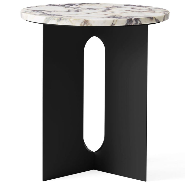 Androgyne Metal Side Table by Audo Copenhagen - The perfectly proportioned table comprises a sturdy powder coated steel base on which a rounded marble tabletop is balanced. The table’s refined marble top, which barely hangs over the legs to create an over