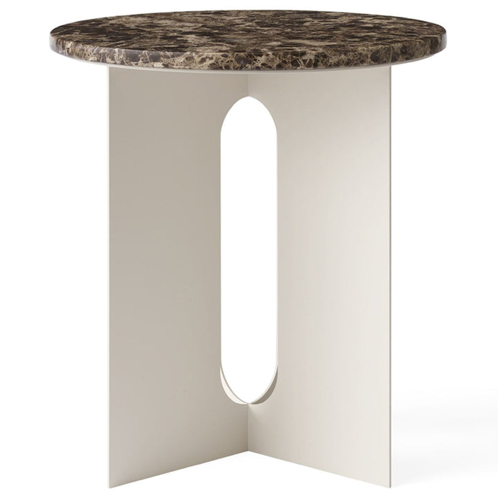Androgyne Metal Side Table by Audo Copenhagen - The perfectly proportioned table comprises a sturdy powder coated steel base on which a rounded marble tabletop is balanced. The table’s refined marble top, which barely hangs over the legs to create an over