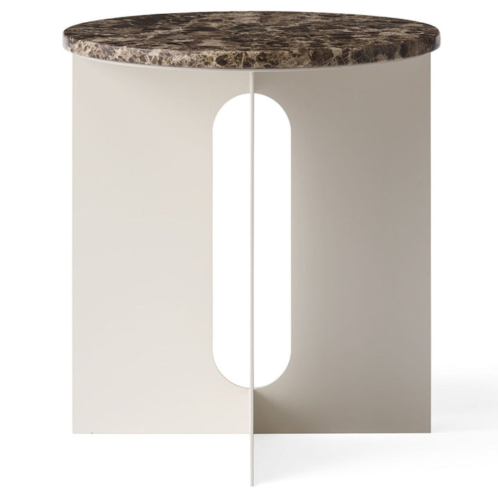 Androgyne Metal Side Table by Audo Copenhagen - The perfectly proportioned table comprises a sturdy powder coated steel base on which a rounded marble tabletop is balanced. The table’s refined marble top, which barely hangs over the legs to create an over