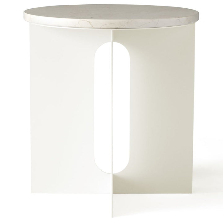 Androgyne Metal Side Table by Audo Copenhagen - The perfectly proportioned table comprises a sturdy powder coated steel base on which a rounded marble tabletop is balanced. The table’s refined marble top, which barely hangs over the legs to create an over