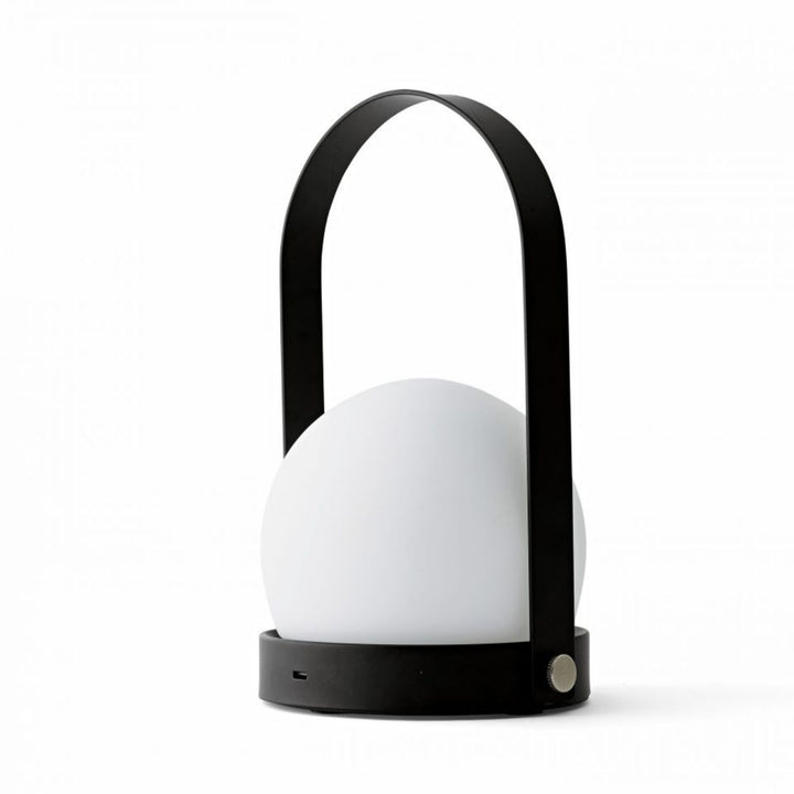 AUDO CPH (ex MENU) Carrie Lamp Portable + Rechargeable, Black by Audo Copenhagen - A minimalist innovation for freedom and flexibility, the Carrie Table Lamp, portable with a metal base and glass shade is unique for its multiple uses and mutability. Usefu