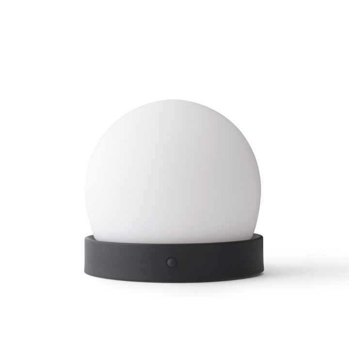 AUDO CPH (ex MENU) Carrie Lamp Portable + Rechargeable, Black by Audo Copenhagen - A minimalist innovation for freedom and flexibility, the Carrie Table Lamp, portable with a metal base and glass shade is unique for its multiple uses and mutability. Usefu