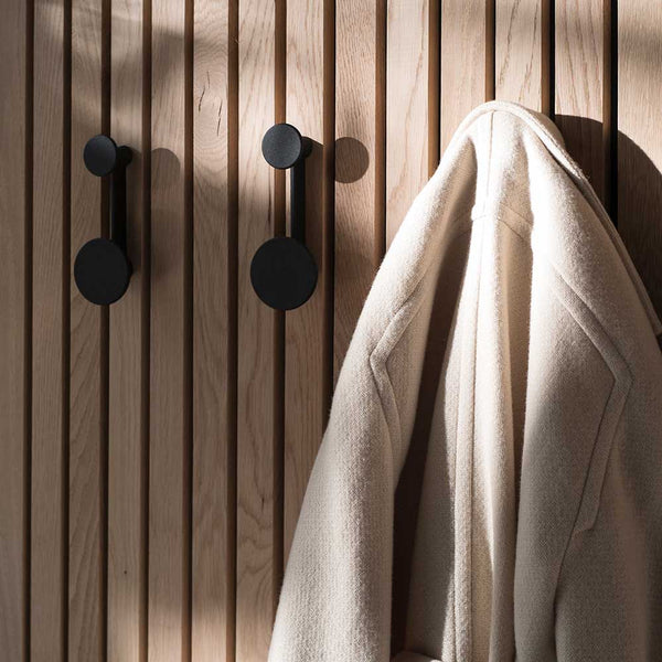 AUDO CPH (ex MENU) Afteroom Coat Hanger, 2 Hooks in One, Black by Audo Copenhagen - The redesigned coat hanger introduces more flexible options, featuring an enlarged version of the 'dot' alongside a downsized version of the original design. Arrange the A
