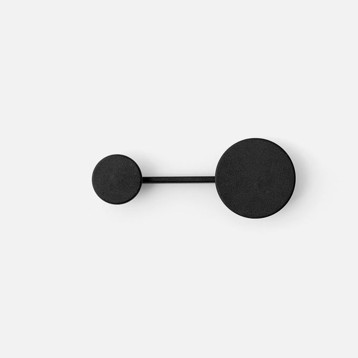 AUDO CPH (ex MENU) Afteroom Coat Hanger, 2 Hooks in One, Black by Audo Copenhagen - The redesigned coat hanger introduces more flexible options, featuring an enlarged version of the 'dot' alongside a downsized version of the original design. Arrange the A