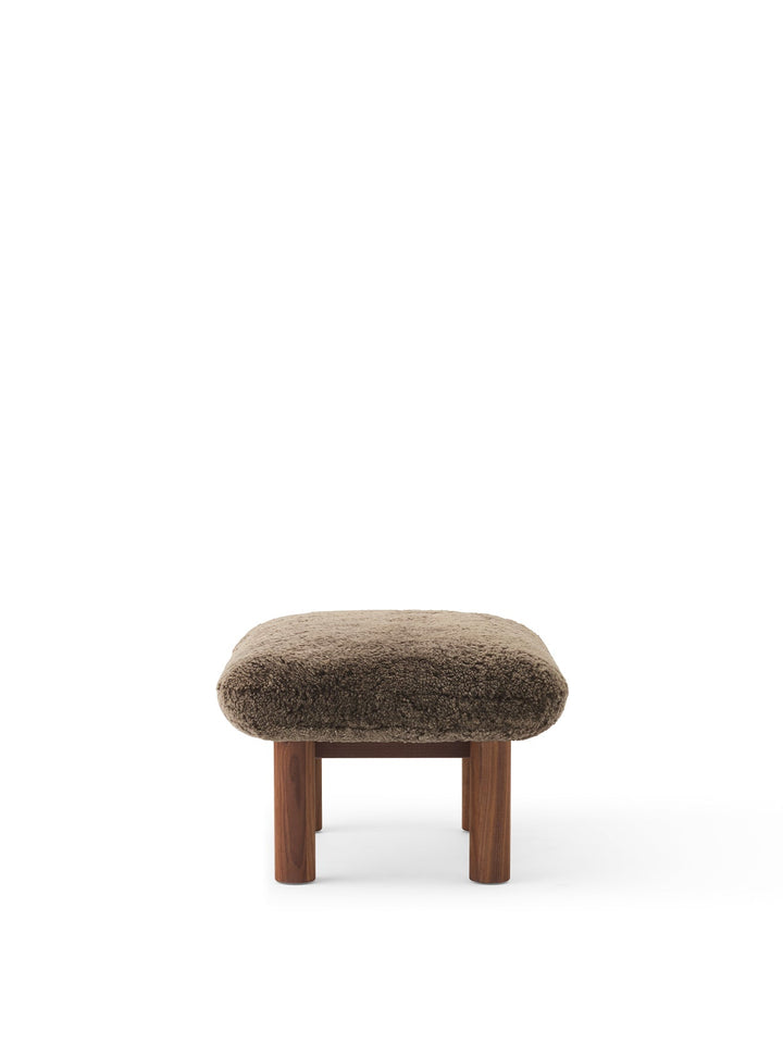 AUDO CPH Brasilia Ottoman, Sheepskin by Audo Copenhagen - The sheepskin edition of AUDO CPH Brasilia Ottoman features a durable, cylindrical leg design and a gently curved cushion. Taking inspiration from mid-20th century Danish craftsmanship and Brazilia