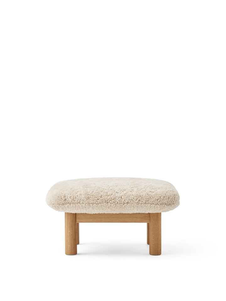 AUDO CPH Brasilia Ottoman, Sheepskin by Audo Copenhagen - The sheepskin edition of AUDO CPH Brasilia Ottoman features a durable, cylindrical leg design and a gently curved cushion. Taking inspiration from mid-20th century Danish craftsmanship and Brazilia