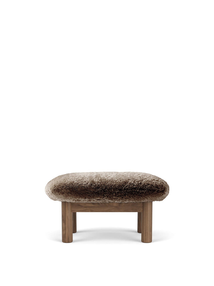 AUDO CPH Brasilia Ottoman, Sheepskin by Audo Copenhagen - The sheepskin edition of AUDO CPH Brasilia Ottoman features a durable, cylindrical leg design and a gently curved cushion. Taking inspiration from mid-20th century Danish craftsmanship and Brazilia
