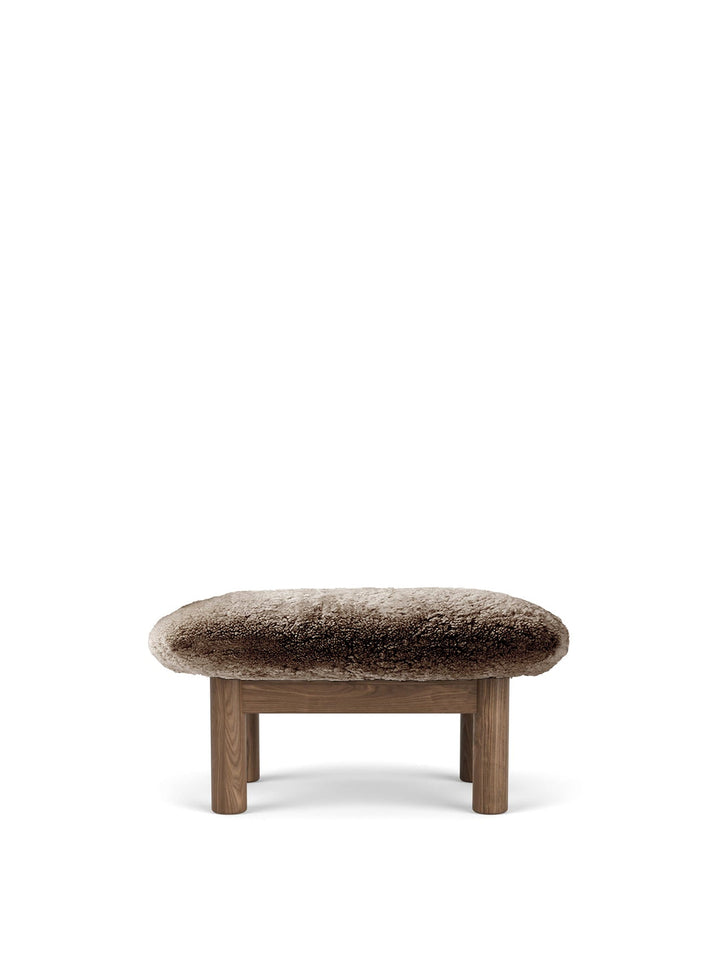 AUDO CPH Brasilia Ottoman, Sheepskin by Audo Copenhagen - The sheepskin edition of AUDO CPH Brasilia Ottoman features a durable, cylindrical leg design and a gently curved cushion. Taking inspiration from mid-20th century Danish craftsmanship and Brazilia