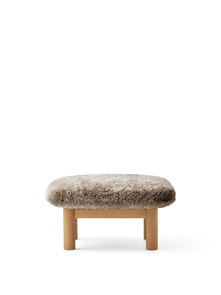 AUDO CPH Brasilia Ottoman, Sheepskin by Audo Copenhagen - The sheepskin edition of AUDO CPH Brasilia Ottoman features a durable, cylindrical leg design and a gently curved cushion. Taking inspiration from mid-20th century Danish craftsmanship and Brazilia