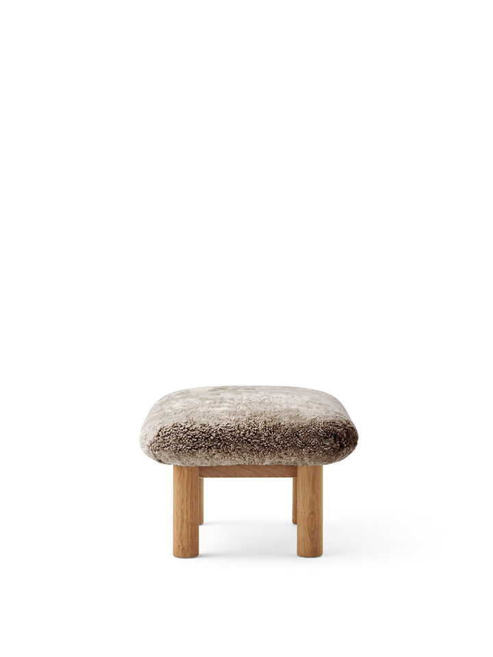 AUDO CPH Brasilia Ottoman, Sheepskin by Audo Copenhagen - The sheepskin edition of AUDO CPH Brasilia Ottoman features a durable, cylindrical leg design and a gently curved cushion. Taking inspiration from mid-20th century Danish craftsmanship and Brazilia