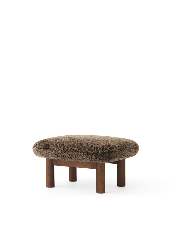 AUDO CPH Brasilia Ottoman, Sheepskin by Audo Copenhagen - The sheepskin edition of AUDO CPH Brasilia Ottoman features a durable, cylindrical leg design and a gently curved cushion. Taking inspiration from mid-20th century Danish craftsmanship and Brazilia