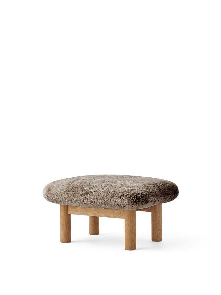 AUDO CPH Brasilia Ottoman, Sheepskin by Audo Copenhagen - The sheepskin edition of AUDO CPH Brasilia Ottoman features a durable, cylindrical leg design and a gently curved cushion. Taking inspiration from mid-20th century Danish craftsmanship and Brazilia