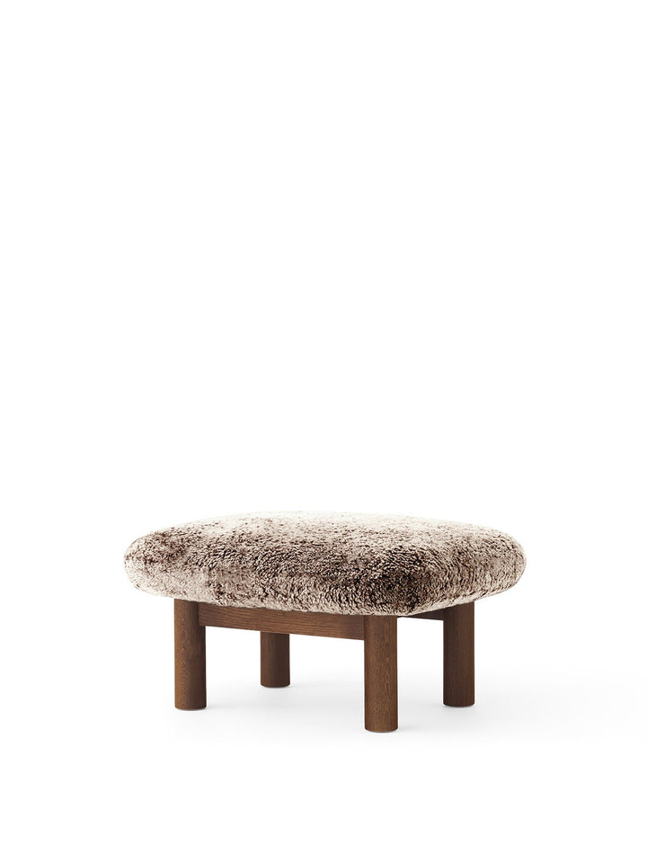 AUDO CPH Brasilia Ottoman, Sheepskin by Audo Copenhagen - The sheepskin edition of AUDO CPH Brasilia Ottoman features a durable, cylindrical leg design and a gently curved cushion. Taking inspiration from mid-20th century Danish craftsmanship and Brazilia