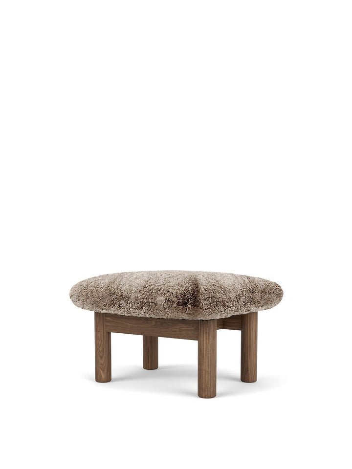 AUDO CPH Brasilia Ottoman, Sheepskin by Audo Copenhagen - The sheepskin edition of AUDO CPH Brasilia Ottoman features a durable, cylindrical leg design and a gently curved cushion. Taking inspiration from mid-20th century Danish craftsmanship and Brazilia