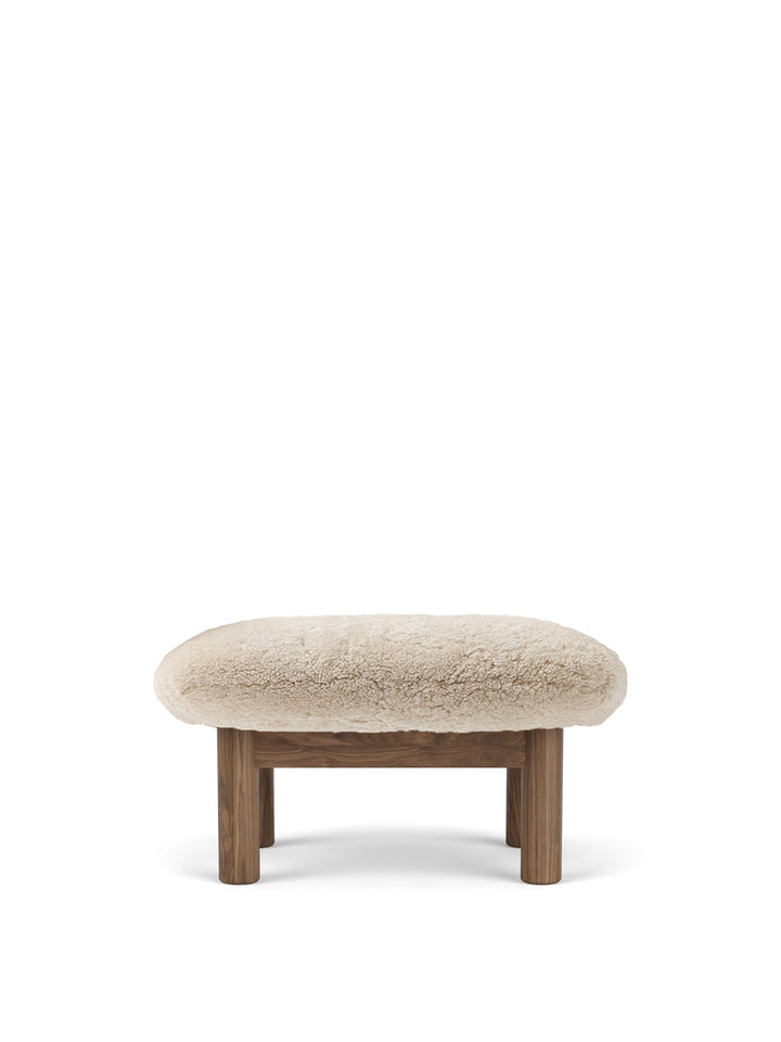 AUDO CPH Brasilia Ottoman, Sheepskin by Audo Copenhagen - The sheepskin edition of AUDO CPH Brasilia Ottoman features a durable, cylindrical leg design and a gently curved cushion. Taking inspiration from mid-20th century Danish craftsmanship and Brazilia