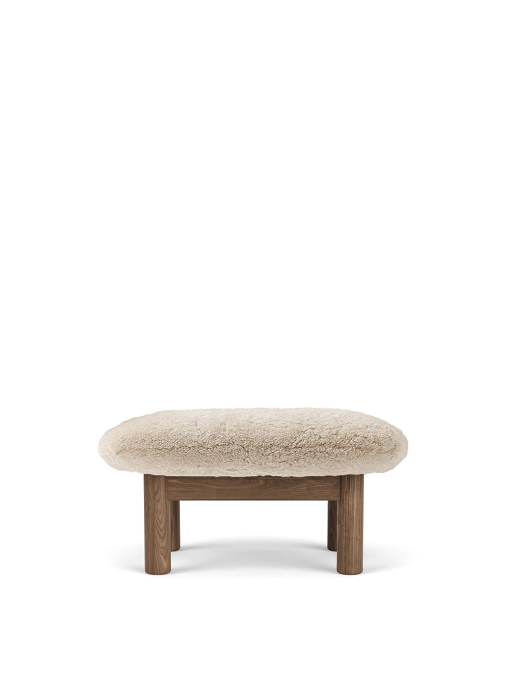 AUDO CPH Brasilia Ottoman, Sheepskin by Audo Copenhagen - The sheepskin edition of AUDO CPH Brasilia Ottoman features a durable, cylindrical leg design and a gently curved cushion. Taking inspiration from mid-20th century Danish craftsmanship and Brazilia