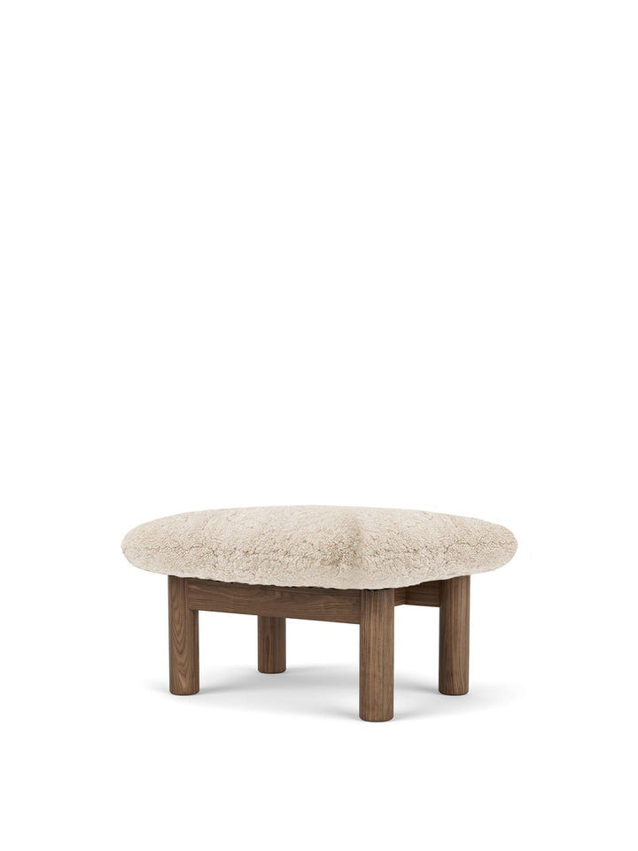 AUDO CPH Brasilia Ottoman, Sheepskin by Audo Copenhagen - The sheepskin edition of AUDO CPH Brasilia Ottoman features a durable, cylindrical leg design and a gently curved cushion. Taking inspiration from mid-20th century Danish craftsmanship and Brazilia