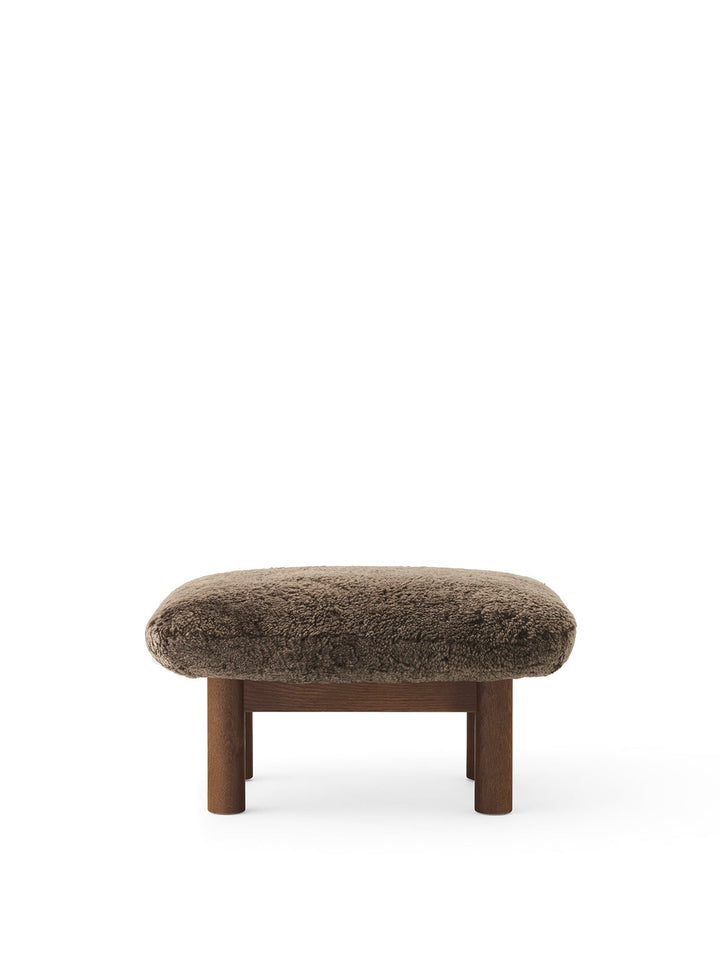 AUDO CPH Brasilia Ottoman, Sheepskin by Audo Copenhagen - The sheepskin edition of AUDO CPH Brasilia Ottoman features a durable, cylindrical leg design and a gently curved cushion. Taking inspiration from mid-20th century Danish craftsmanship and Brazilia