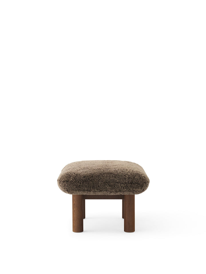 AUDO CPH Brasilia Ottoman, Sheepskin by Audo Copenhagen - The sheepskin edition of AUDO CPH Brasilia Ottoman features a durable, cylindrical leg design and a gently curved cushion. Taking inspiration from mid-20th century Danish craftsmanship and Brazilia