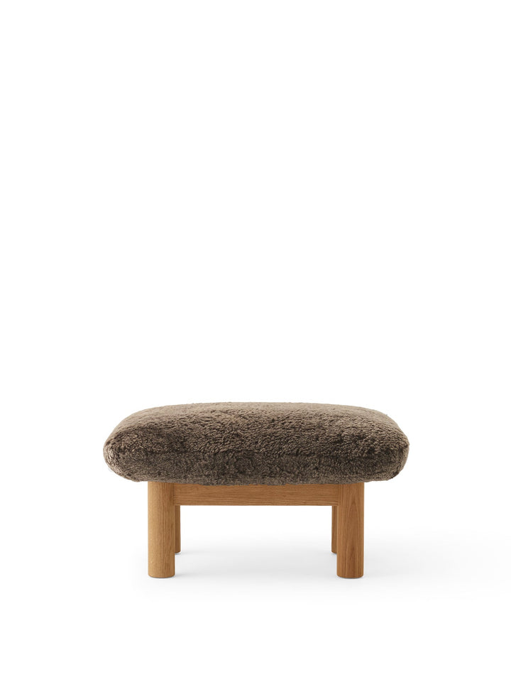 AUDO CPH Brasilia Ottoman, Sheepskin by Audo Copenhagen - The sheepskin edition of AUDO CPH Brasilia Ottoman features a durable, cylindrical leg design and a gently curved cushion. Taking inspiration from mid-20th century Danish craftsmanship and Brazilia