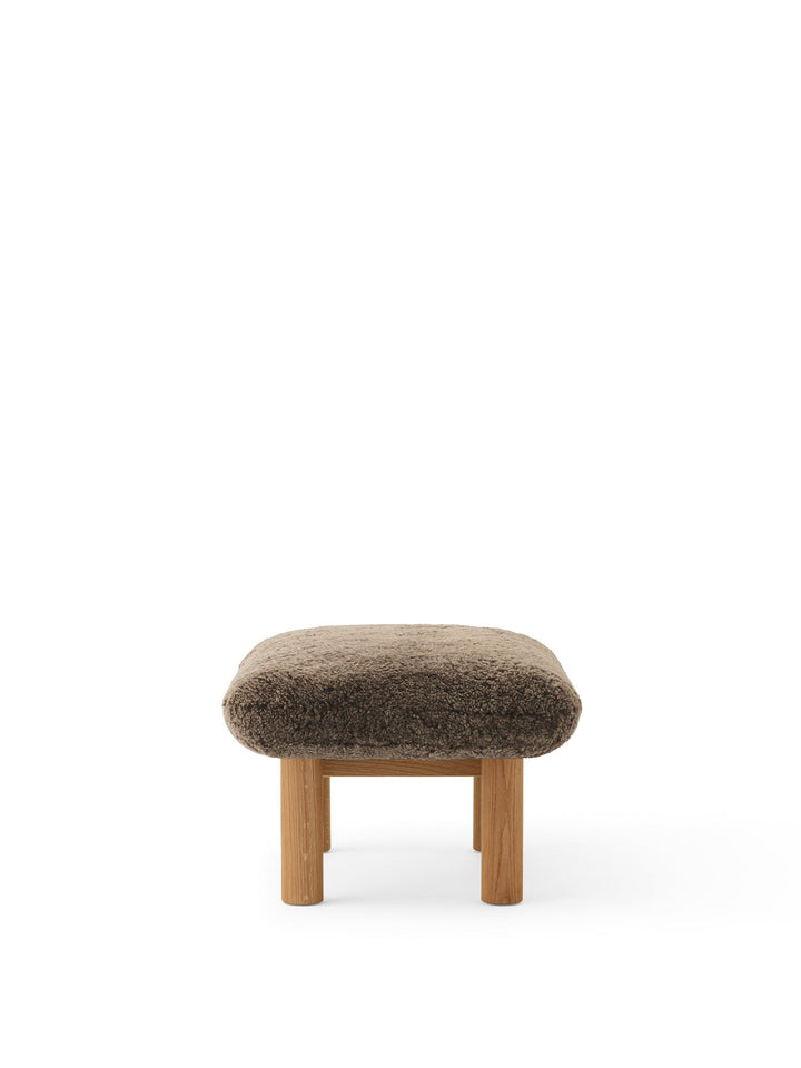 AUDO CPH Brasilia Ottoman, Sheepskin by Audo Copenhagen - The sheepskin edition of AUDO CPH Brasilia Ottoman features a durable, cylindrical leg design and a gently curved cushion. Taking inspiration from mid-20th century Danish craftsmanship and Brazilia