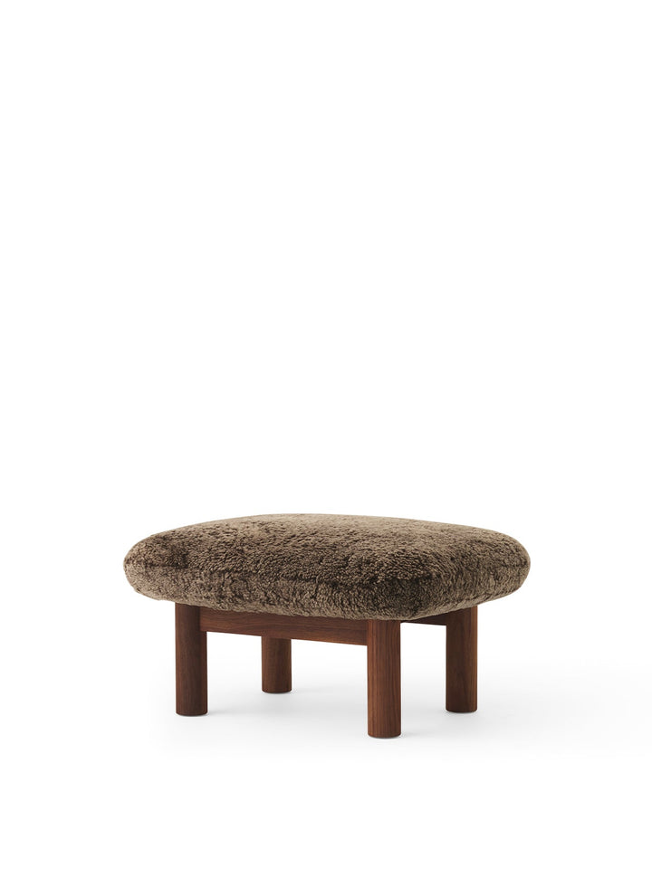 AUDO CPH Brasilia Ottoman, Sheepskin by Audo Copenhagen - The sheepskin edition of AUDO CPH Brasilia Ottoman features a durable, cylindrical leg design and a gently curved cushion. Taking inspiration from mid-20th century Danish craftsmanship and Brazilia