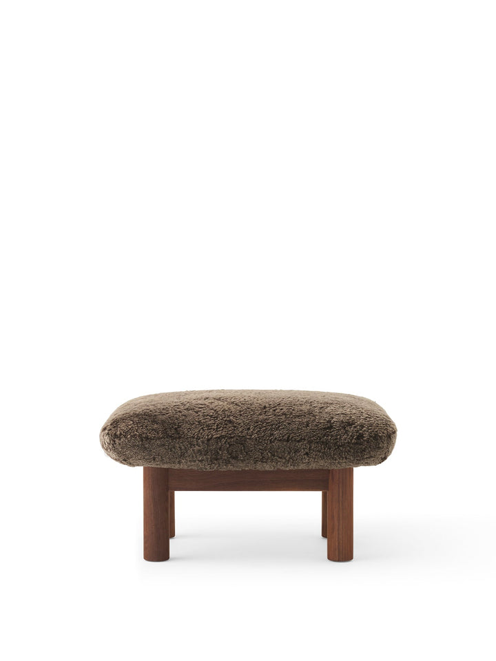 AUDO CPH Brasilia Ottoman, Sheepskin by Audo Copenhagen - The sheepskin edition of AUDO CPH Brasilia Ottoman features a durable, cylindrical leg design and a gently curved cushion. Taking inspiration from mid-20th century Danish craftsmanship and Brazilia
