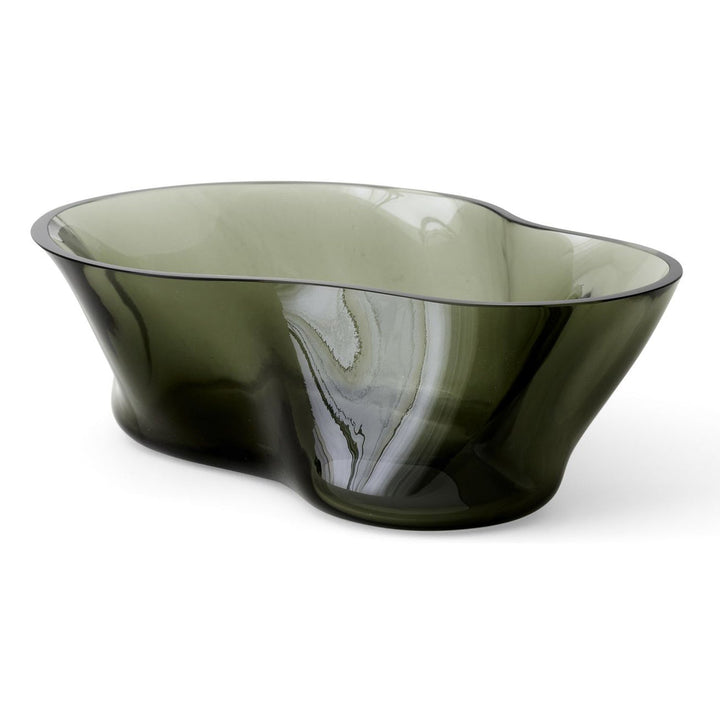 Aer Bowl by Audo Copenhagen - The undulating Aer Bowl in smoke glass brings sculptural appeal to surfaces—whether filled with treats or placed on a surface as a decorative object. Taking its cues from the spiralling movement of air seen through smoke or m