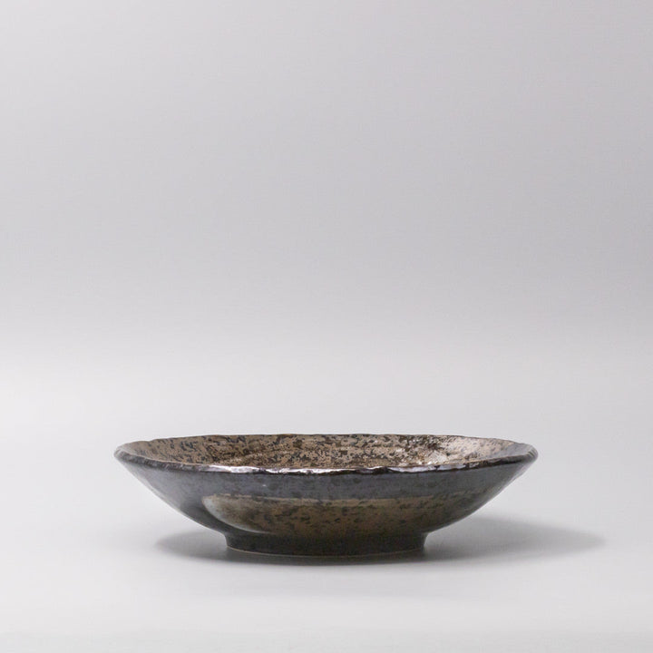 24cm handcrafted bowl in brushstroke black glaze for serving salads, pasta, and rice with a modern sculptural design.