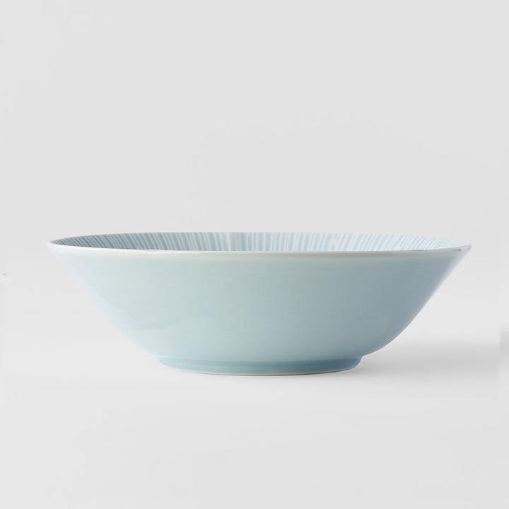 Ice blue glazed bowl with radial texture, perfect for serving salads and pasta, 21cm, 700ml capacity.