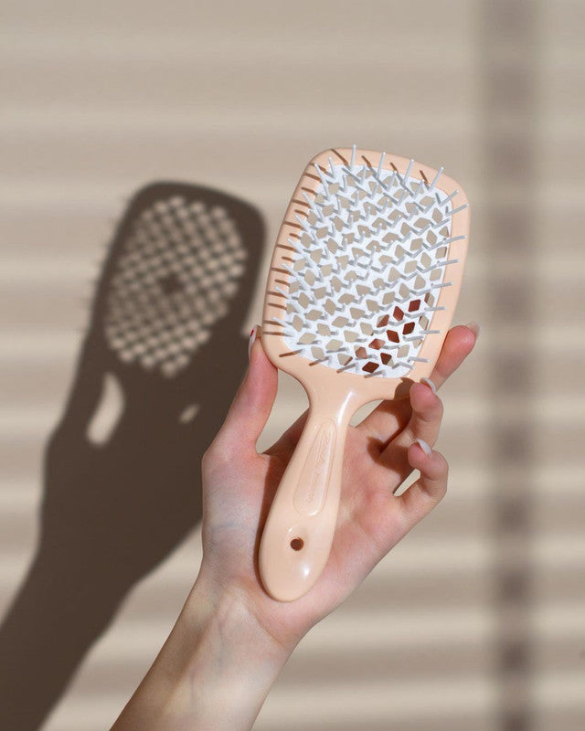 Janake Super Brush ( Multi Colours ) | Australian Stockist This brush features vented styling and nylon bristles, suitable for all hair types. Introducing The Superbrush by Janeke, a beloved patented styling brush that detangles with ease, speeds up blow