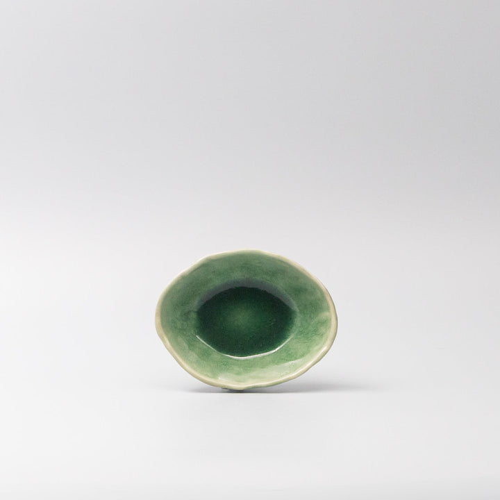 Oval 13.5cm Amane bowl in emerald glaze, perfect for dips and sauces, featuring a glossy jade finish and artisan crackle details.