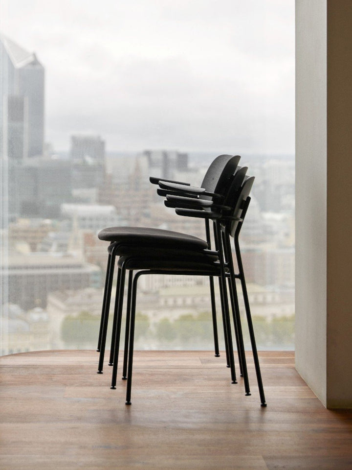 Co Dining Chair, with armrest, Black, Veneer by Audo Copenhagen - Together, mutually, in common: the words that define the prefix ‘co-’ are at the heart of our new Co Dining Chair design. Conceived in collaboration with The Office Group and Norm Architect